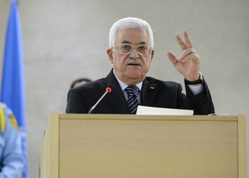 Palestinian president Mahmud Abbas addresses the UN Human Rights Council on October 28, 2015 during a special meeting requested by the Palestinians amid a surge in Israeli-Palestinian violence. Abbas calls for 'international protection regime' for Palestinians as UN High Commissioner for Human Rights warned that a wave of deadly Israeli-Palestinian violence was "dangerous in the extreme" and could lead to a "catastrophe."   AFP PHOTO / FABRICE COFFRINI