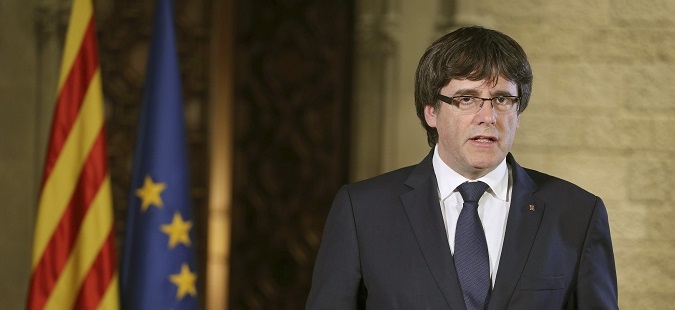 epa06281091 A handout photo made available by the Generalitat de Catalunya of Catalonian President Carles Puigdemont giving a statement in Barcelona, Spain, after the Extraordinary Cabinet Meeting, 21 October 2017. Spanish Prime Minister, Mariano Rajoy, explained the implementation of Article 155 of the Spanish Constitution and said the central Government will asume the competence to disolve the Catalan regional Parliament in order to call for elections in Catalonia. The Article 155 of Spain's constitution, allows the government to impose direct rule in a crisis on any of the country's semi-autonomous regions.  EPA-EFE/RUBEN MORENO GARCIA / GENERALITAT DE CATALUNYA / HANDOUT  HANDOUT EDITORIAL USE ONLY/NO SALES