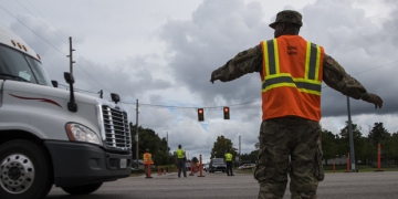 epa07017036 A handout photo made available by the US Army National Guard on 13 September 2018 shows South Carolina National Guard Soldiers from B Battery, 1st of the 178th Field Artillery working with South Carolina Highway Patrol officers at a traffic control point in Conway, South Carolina, USA, 11 September 2018, during the lane reversal of Highway 501 in support of the Myrtle Beach area evacuation to safeguard the citizens of the state in advance of Hurricane Florence. Approximately 2,000 Soldiers and Airmen have been mobilized to prepare, respond and participate in recovery efforts for Hurricane Florence, a Category 4 storm, with a projected path to make landfall along the Carolinas and east coast.  EPA-EFE/US ARMY NATIONAL GUARD/SSGT ERICA KNIGHT HANDOUT  HANDOUT EDITORIAL USE ONLY/NO SALES