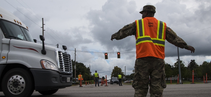epa07017036 A handout photo made available by the US Army National Guard on 13 September 2018 shows South Carolina National Guard Soldiers from B Battery, 1st of the 178th Field Artillery working with South Carolina Highway Patrol officers at a traffic control point in Conway, South Carolina, USA, 11 September 2018, during the lane reversal of Highway 501 in support of the Myrtle Beach area evacuation to safeguard the citizens of the state in advance of Hurricane Florence. Approximately 2,000 Soldiers and Airmen have been mobilized to prepare, respond and participate in recovery efforts for Hurricane Florence, a Category 4 storm, with a projected path to make landfall along the Carolinas and east coast.  EPA-EFE/US ARMY NATIONAL GUARD/SSGT ERICA KNIGHT HANDOUT  HANDOUT EDITORIAL USE ONLY/NO SALES