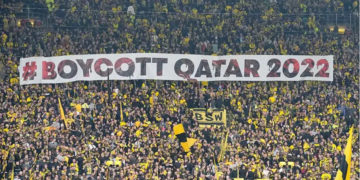 Fans display a banner during the German Bundesliga soccer match between Borussia Dortmund and VfB Stuttgart in Dortmund, Germany, Saturday, Oct. 22, 2022/ AP Photo/Martin Meissner