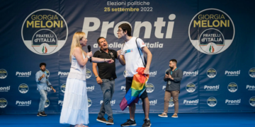 Giorgia Meloni, left, now Italy’s prime minister, being confronted last year by an activist at a rally in Cagliari, Italy. Ms. Meloni gave impassioned speeches on the campaign trail against same-sex parents.Credit...Gianni Cipriano for The New York Times