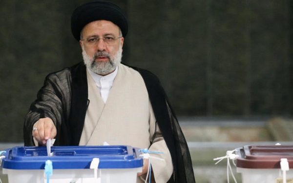 TEHRAN, IRAN - JUNE 18: Iranian ultraconservative cleric and presidential candidate Ebrahim Raisi casts his ballot for presidential election on June 18, 2021 in Tehran, Iran. The country's incumbent president, Hassan Rouhani, is ineligible to run again after serving two terms in office. (Photo by Meghdad Madadi ATPImages/Getty Images)