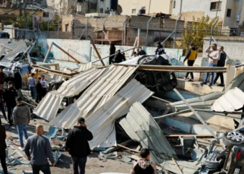 Palestinians inspect the damage following an Israeli raid in Jenin in the West Bank January 26, 2023.
(photo credit: REUTERS/RANEEN SAWAFTA)