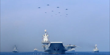 Warships and fighter jets of the PLA Navy take part in a military display in the South China Sea on April 12, 2018. Photo: Facebook