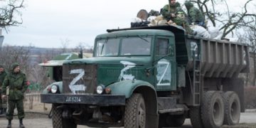 DONETSK, UKRAINE - MARCH 01: Pro-Russian separatists, in uniforms without insignia, gather in the separatist-controlled settlement of Mykolaivka (Nikolaevka) and Bugas, in Donetsk region (DPR) of Ukraine on March 01, 2022. ( Stringer - Anadolu Agency )