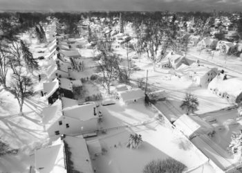 A drone image captures a neighborhood, in Cheektowaga, N.Y., More snow is expected in Western New York on Monday. (John Waller/AP)