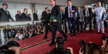 President Jair Bolsonaro of Brazil arriving for a news conference yesterday in Brasília, the capital.Dado Galdieri for The New York Times