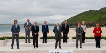 epa09262286 (L) Canada's prime minister Justin Trudeau, president of the European Council Charles Michel, US President Joe Biden, Japan's prime minister Yoshihide Suga, British prime minister Boris Johnson, Italy's prime minister Mario Draghi, France?s president Emmanuel Macron, president of the European Commission Ursula von der Leyen, Germany?s chancellor Angela Merkel, during the family photo on the first day of the Group of Seven (G7)  leaders summit in Carbis Bay, Cornwall, Britain, 11 June 2021. Britain hosts the G7 summit in Cornwall in from 11 to 13 June 2021.  EPA-EFE/HOLLIE ADAMS/POOL