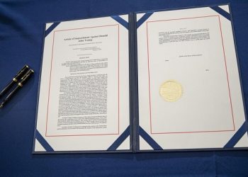 epa08936257 The article of impeachment passed by the House is ready for Speaker of the House Nancy Pelosi's signature in the US Capitol in Washington, DC, USA, 13 January 2021. US President Donald J. Trump was impeached for incitement of insurrection following the attack on the Capitol on 06 January as lawmakers worked to certify Joe Biden as the next President of the United States.  This is the second time the US House of Representatives impeach Trump, making him the first President to be impeached twice.  EPA-EFE/SHAWN THEW
