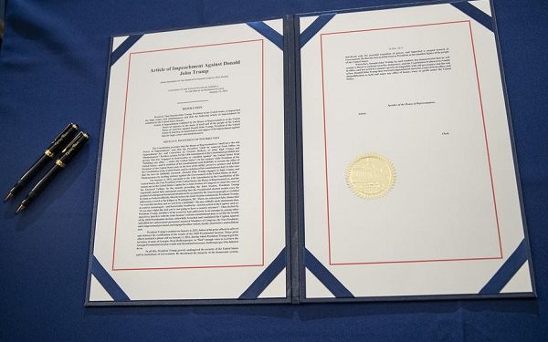 epa08936257 The article of impeachment passed by the House is ready for Speaker of the House Nancy Pelosi's signature in the US Capitol in Washington, DC, USA, 13 January 2021. US President Donald J. Trump was impeached for incitement of insurrection following the attack on the Capitol on 06 January as lawmakers worked to certify Joe Biden as the next President of the United States.  This is the second time the US House of Representatives impeach Trump, making him the first President to be impeached twice.  EPA-EFE/SHAWN THEW