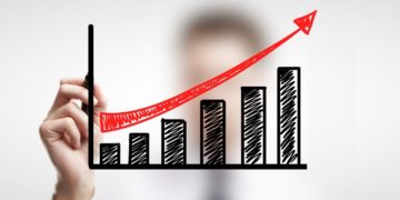 man drawing schedule of business growth