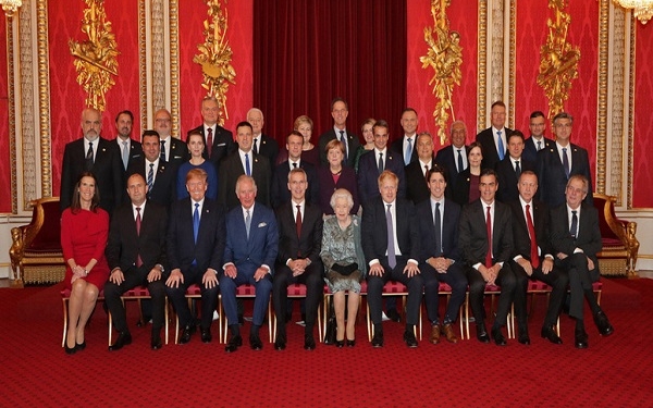 Family photo with Her Majesty the Queen, the Prince of Wales, NATO Secretary General Jens Stoltenberg and NATO Heads of State and/or Government