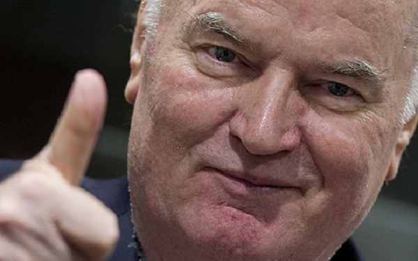 epa06343535 Bosnian Serb military chief Ratko Mladic shows a thumb up, as he enters the Yugoslav War Crimes Tribunal for the verdict hearing in his genocide trial, in The Hague, Netherlands, 22 November 2017. Mladic's trial is the last major case for the Netherlands-based tribunal for former Yugoslavia, which was set up in 1993 to prosecute those most responsible for the worst carnage in Europe, since World War II.  EPA-EFE/PETER DEJONG / POOL