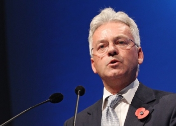 LONDON, ENGLAND - OCTOBER 31:  Minister of State for International Development Alan Duncan presents at the closing ceremony of the World Islamic Economic Forum at ExCel on October 31, 2013 in London, England.  (Photo by Miles Willis/Getty Images for 9th World Islamic Economic Forum)