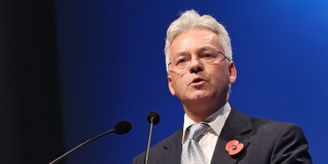 LONDON, ENGLAND - OCTOBER 31:  Minister of State for International Development Alan Duncan presents at the closing ceremony of the World Islamic Economic Forum at ExCel on October 31, 2013 in London, England.  (Photo by Miles Willis/Getty Images for 9th World Islamic Economic Forum)