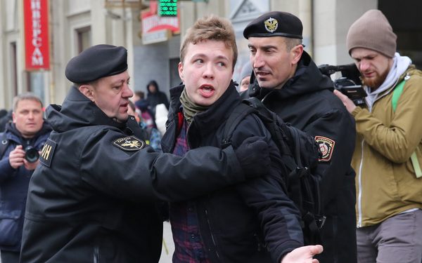 epa09223072 (FILE) Police officers detain a journalist Roman Protasevich attempting to cover a rally in Minsk, Belarus, 26 March 2017 (reissued 23 May 2021). A Ryanair flight from Athens, Greece to Vilnius, Lithuania, with Belarus' opposition journalist Roman Protasevich onboard, has been diverted and forced to land in Minsk on 23 May 2021, after alleged bomb threat. Protasevich was detained by Belarusian Police after landing, as Belarusian Human Rights Center 'Viasna' reports and Lithuanian President Gitanas Nauseda demanded immediate release of Protasevich.  EPA-EFE/STRINGER