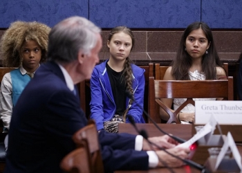 epa07848948 Greta Thunberg (2-L), the 16 year old climate change activist from Sweden, attends a Senate Climate Change Task Force meeting in the US Capitol in Washington, DC, USA, 17 September 2019. The meeting is part of a week of activities culminating in a climate strike on Friday, 20 September, in which workers and students around the world will walk out to demand more action to fight global warming.  EPA-EFE/SHAWN THEW