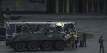 epaselect epa08559219 Policemen ride an armoured personnel carrier (APC) during the release of hostages captured in the bus in the downtown of the Western Ukrainian city of Lutsk, western Ukraine, 21 July 2020. According to local media, an armed man had taken the commuter bus' passengers and driver hostage. Shots were reported at the scene. The head of the National Police's regional department, Yuriy Kroshko, said the attacker had threatened hostages with a firearm and an explosive device. Ukraine's Deputy Interior Minister Anton Gerashchenko said the alleged hijacker had identified himself as Maksym Plokhoy. The suspect also claimed he had planted another explosive in an unspecified crowded location in Lutsk and said he would set off that bomb if his demands were not met. According to officials, Plokhoy is a convicted felon and has a history of mental disorders.  EPA-EFE/MARKIIAN LYSEIKO