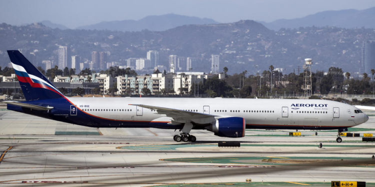 epa09482732 An Aeroflot Russian Airlines Boeing 777-3M0ER (tail number VQ-BQE) lands at the Los Angeles Airport in Los Angeles, California, USA, 22 September 2021.  EPA-EFE/ETIENNE LAURENT