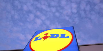 epa09510552 A view of the logo of a Lidl store in Riga, Latvia, 07 October 2021. German retailer Lidl opened 15 stores in Latvia on October 7. Lidl is a German international discount retailer chain that operates over 12,000 stores across Europe and the United States.  EPA-EFE/TOMS KALNINS