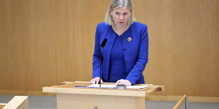 epa09950441 Swedish Prime Minister Magdalena Andersson speaks during a parliamentary debate on Sweden's application for NATO membership, at the Swedish Parliment in Stockholm, Sweden, 16 May 2022. The Swedish Parliament is holding a special debate about applying for NATO membership, paving the way for the expansion of the alliance.  EPA-EFE/HENRIK MONTGOMERY  SWEDEN OUT